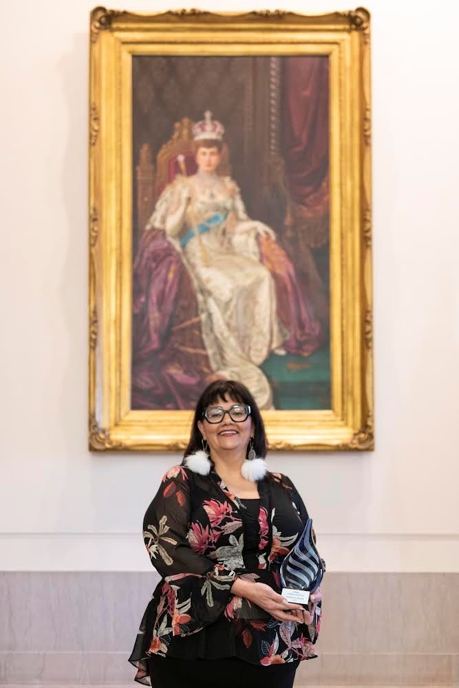 Hilda Anderson-Pyrz, with her Empower Women Award