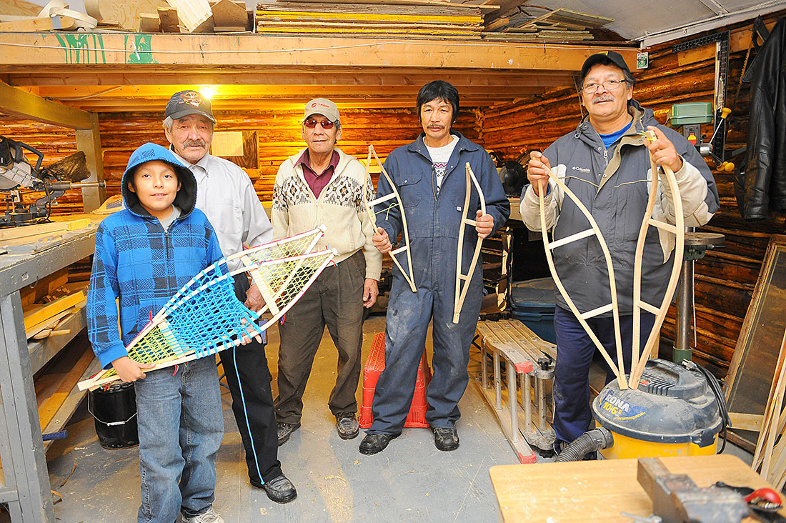 Youth & Elder Making Snow Shoes